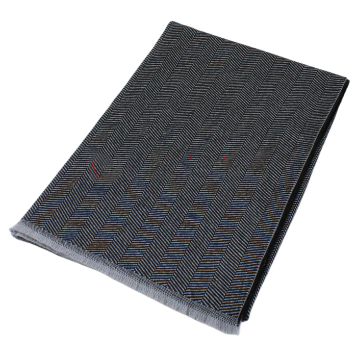 Plaid Colorado en laine vierge mérinos - Motif chevrons noir et gris - Luxe et confort intemporel